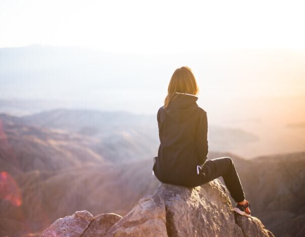 sitting on a mountain