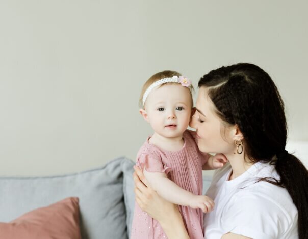 woman holding baby