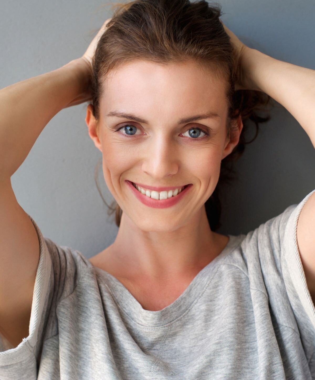 Fort Lauderdale blepharoplasty model with grey shirt